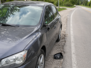 aanrijding tegen stilstaande auto